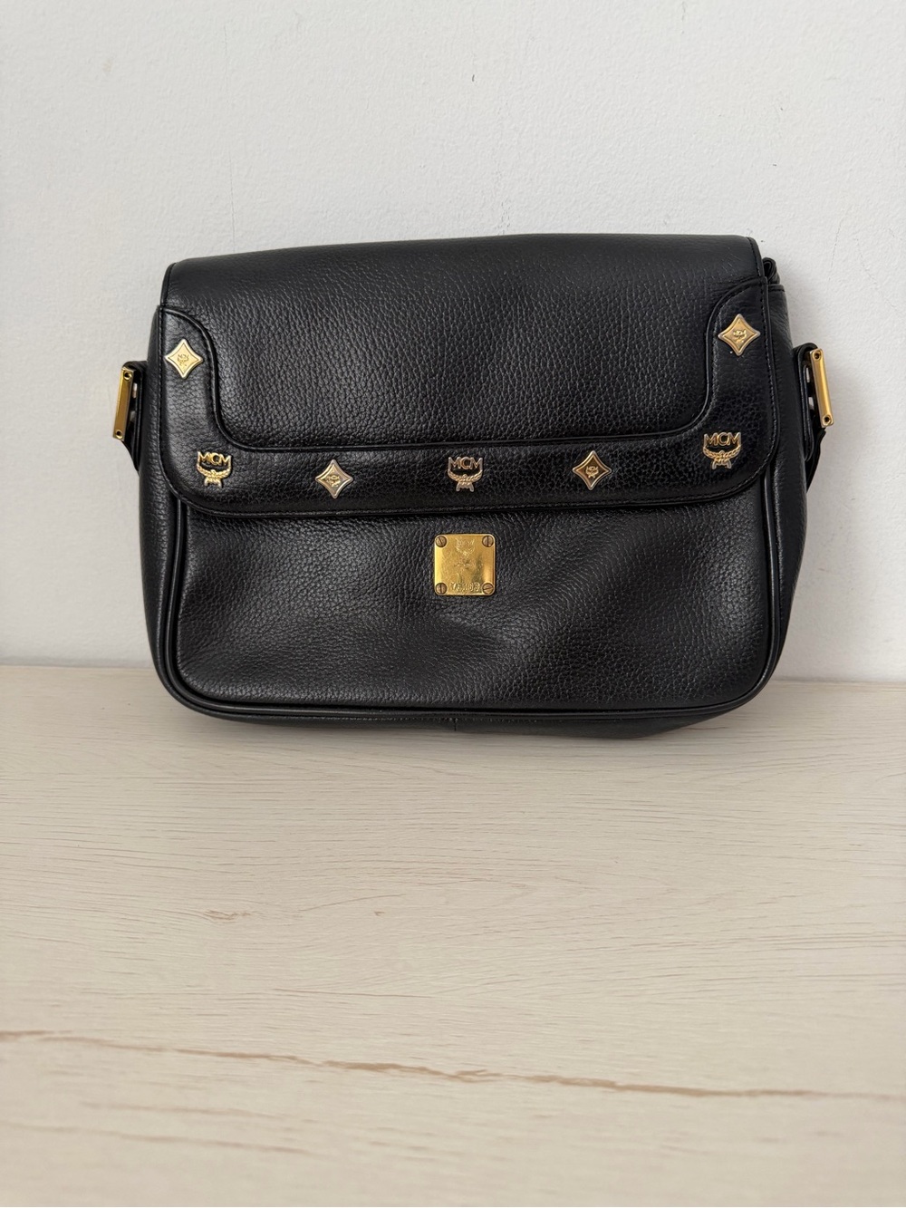 MCM Black Pebbled Leather Shoulder Bag with Gold Accents